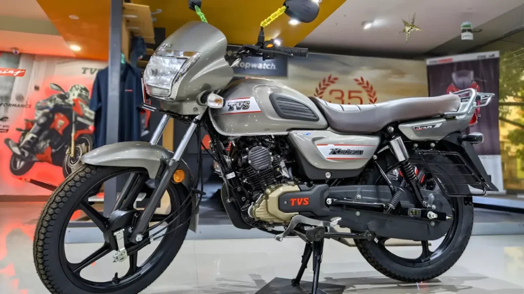 TVS Radeon 2025 side profile showing premium styling with LED DRL and alloy wheels